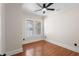 A simple bedroom with wood floor, clean lines, white trim and great natural light at 951 9Th S Ave, St Petersburg, FL 33705