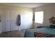 Bedroom boasts lots of closet space, wood floors and a decorative headboard at 104 Gloucester Blvd # 340, Sun City Center, FL 33573