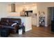 Inviting open-concept layout showcases the living room and modern kitchen at 104 Gloucester Blvd # 340, Sun City Center, FL 33573