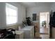 Well-lit laundry room with modern appliances and ample space at 104 Gloucester Blvd # 340, Sun City Center, FL 33573