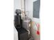 Water heater with filtration system in utility area at 104 Gloucester Blvd # 340, Sun City Center, FL 33573