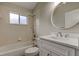 Clean bathroom featuring a tub/shower combination and a vanity at 10614 Chambers Dr, Tampa, FL 33626