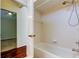 Clean bathroom with tub and shower combination at 10614 Chambers Dr, Tampa, FL 33626
