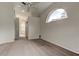 Bedroom with an abundance of natural light and an entrance to the bathroom at 10614 Chambers Dr, Tampa, FL 33626