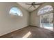 Bedroom with an abundance of natural light and sliding glass doors to the pool area at 10614 Chambers Dr, Tampa, FL 33626