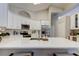 Spacious kitchen island with quartz countertops and stainless steel appliances for easy cooking at 10614 Chambers Dr, Tampa, FL 33626