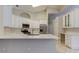 Modern kitchen with large island, stainless steel appliances, and plenty of counter space at 10614 Chambers Dr, Tampa, FL 33626