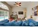 Cozy living room with pool views, comfortable seating, and stylish decor creates a relaxing atmosphere at 10614 Chambers Dr, Tampa, FL 33626