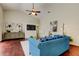 Comfortable living room with high ceilings, modern décor, and plenty of natural light at 10614 Chambers Dr, Tampa, FL 33626