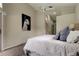Spacious main bedroom, featuring neutral walls and carpet, along with view of a doorway at 10614 Chambers Dr, Tampa, FL 33626