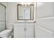 Well-lit bathroom featuring a white vanity with a light countertop and a chrome faucet at 11885 Richmond Trl, Parrish, FL 34219
