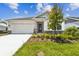 Charming single-story home with a well-manicured lawn and inviting curb appeal at 11885 Richmond Trl, Parrish, FL 34219