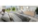Serene main bedroom with soft carpet, bright natural light, and tasteful modern decor at 11885 Richmond Trl, Parrish, FL 34219