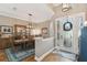 Charming entryway featuring a dining area and a view of the decorative front door at 1514 River Ct, Tarpon Springs, FL 34689