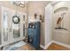 Stylish entryway featuring a unique decor, including a white door and artistic furnishings at 1514 River Ct, Tarpon Springs, FL 34689