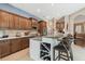 Lovely kitchen with a center island with barstool seating, and stainless steel appliances at 1514 River Ct, Tarpon Springs, FL 34689