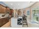 Beautiful kitchen with a large center island, built-in wine rack, and bar seating at 1514 River Ct, Tarpon Springs, FL 34689