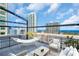 Balcony featuring city views, stylish outdoor seating, and hammock perfect for relaxing at 175 2Nd S St # P03, St Petersburg, FL 33701