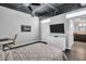 Inviting bedroom with waterfront views, modern furniture, and an ensuite bathroom for added convenience at 175 2Nd S St # P03, St Petersburg, FL 33701