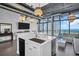 Island kitchen featuring sleek appliances, ample counter space, and a seamless connection to the living area at 175 2Nd S St # P03, St Petersburg, FL 33701