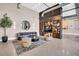 Sophisticated living room with plush seating, unique shelving, and stylish decor at 175 2Nd S St # P03, St Petersburg, FL 33701