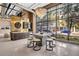 Modern lounge area with contemporary seating, stylish lighting, and large windows at 175 2Nd S St # P03, St Petersburg, FL 33701