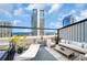 Enjoy city views from this rooftop terrace featuring outdoor seating and a relaxing hammock at 175 2Nd S St # P03, St Petersburg, FL 33701