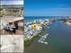 Beautiful aerial view of waterfront homes and docks on a sunny day with a blue sky and water at 19915 Gulf Blvd # 704, Indian Shores, FL 33785