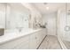 Elegant bathroom with a spacious vanity, modern fixtures, and a pristine glass-enclosed shower at 19915 Gulf Blvd # 704, Indian Shores, FL 33785