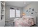 Charming bedroom decorated with Florida Gators memorabilia and pink butterfly decals at 19915 Gulf Blvd # 704, Indian Shores, FL 33785