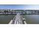 Waterfront dock featuring boat slips and access to the open water, perfect for boating enthusiasts at 19915 Gulf Blvd # 704, Indian Shores, FL 33785