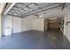 Spacious garage with epoxy flooring, sink, and ample storage space for vehicles and equipment at 19915 Gulf Blvd # 704, Indian Shores, FL 33785