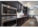 Contemporary kitchen with stainless steel appliances, ample counter space, and stylish finishes at 19915 Gulf Blvd # 704, Indian Shores, FL 33785