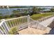 Outdoor patio and canal view, creating a relaxing and private space at 19915 Gulf Blvd # 704, Indian Shores, FL 33785