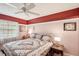 Bright bedroom with a large window and a comfortable queen-size bed at 2122 Hailstone Cir, Sun City Center, FL 33573