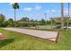 Outdoor bocce ball court with shaded seating area, perfect for friendly competition at 29443 Zeller Ave, San Antonio, FL 33576