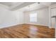 Bright dining room featuring new wood floors, chandelier, and a window at 29443 Zeller Ave, San Antonio, FL 33576