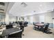 Game room with poker table and chairs, perfect for relaxing and entertaining guests in this elegant space at 29443 Zeller Ave, San Antonio, FL 33576