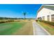 A picturesque golf course view with meticulously landscaped grounds and mature trees at 29443 Zeller Ave, San Antonio, FL 33576
