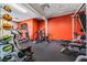 This spacious gym features modern equipment and a bright, vibrant color scheme, great for a healthy lifestyle at 29443 Zeller Ave, San Antonio, FL 33576