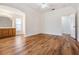 Spacious primary bedroom with wood floors, ensuite bathroom, and ample natural light at 29443 Zeller Ave, San Antonio, FL 33576