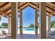 An open air structure at the pool area featuring tile floors, a pool view and tables at 29443 Zeller Ave, San Antonio, FL 33576