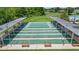 Overhead shot of shuffleboard courts with covered seating, a great way to socialize outdoors at 29443 Zeller Ave, San Antonio, FL 33576