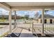 Scenic view of the pool and golf course from a covered outdoor seating area at 29443 Zeller Ave, San Antonio, FL 33576