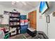 This bedroom is equipped with a television, storage, and ceiling fan at 303 Grand Ave, Brooksville, FL 34604