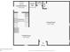 Floor plan displaying the layout of the first floor featuring a living room and dining area at 303 Grand Ave, Brooksville, FL 34604