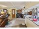 Open-concept living room flows into the kitchen, bright space with lots of room at 303 Grand Ave, Brooksville, FL 34604