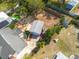 Aerial view of the home, garage, and large lot at 305 6Th Sw Ave, Largo, FL 33770