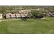 Scenic view of townhomes backing onto a meticulously maintained golf course at 3130 Eagles Landing W Cir, Clearwater, FL 33761