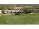 View of the golf course with homes and lush green landscape at 3130 Eagles Landing W Cir, Clearwater, FL 33761